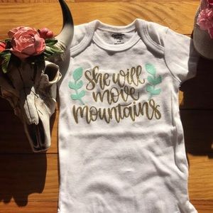 She Will Move Mountains Onesie